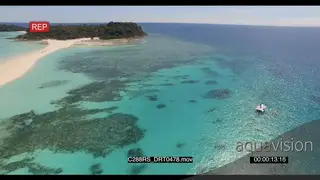 AERIAL of the Madagascar Island and boat sailing GOOD LIGHT