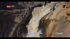 close up tilt down shot of Augrabies falls at sunset, extra slow motion
