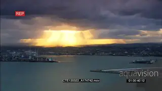 Scenic TL Sunset over Durban habour area rays shinning through clouds