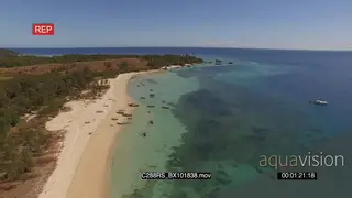 AERIAL of the Madagascar Island and boats on one side of the Island GOOD LIGHT
