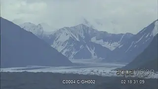 Scenic view of rugged mountains.