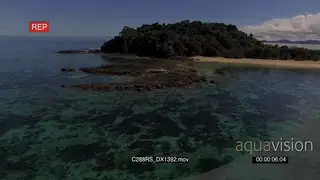 AERIALS of the Krakatea Island and a boat on water GOOD LIGHT GREEN