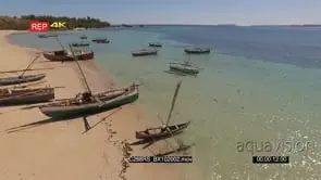 AERIAL of the Madagascar Island with people standing near the boats GOOD LIGHT