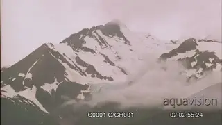 Landscape Glacier cloud time-lapse and rugged mountain. Scenic shot.