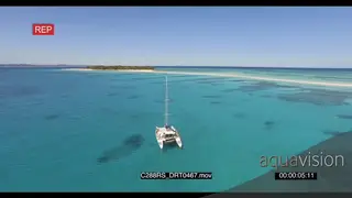 AERIAL of boats sailing with Tourists enjoying the ride in the Madagascar Island