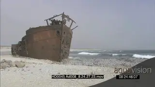 Shipwreck on ocean beachfront
