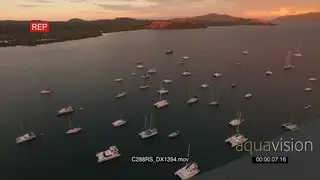 AERIAL of boats that sailed into Krakatea Island SUNSET