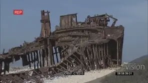 Iron wreck on beach LS