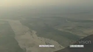 Aerial Whip Pan Mashatu along dry delta riverbed