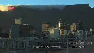 Cape Town City Table mountain in BG with cloud covering whip pan across to Signal hill