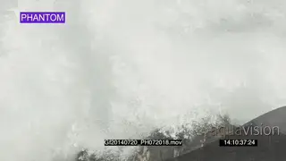 Big waves rolling in over rocks PHANTOM