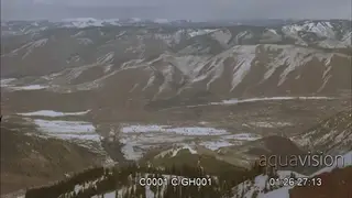 Extreme wide shot of rugged mountains.