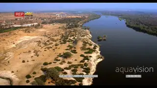High aerial shot along chobe river during dry season with kasane in the distance from the.