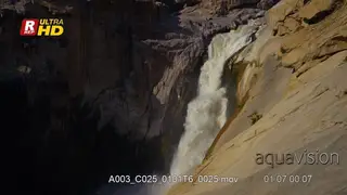 close up tilt down shot of Augrabies falls at sunset
