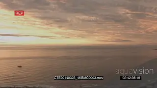 Scenic Cape Town Green point stadium pan across ocean golden sunset light