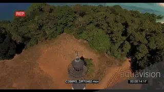 AERIAL of the Madagascar Island and the light house on the Island GOOD LIGHT GREEN