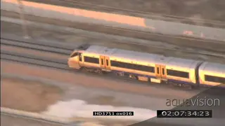 View of the city of Johannesburg and the Gautrain moving on rails AERIAL TRAVELING…